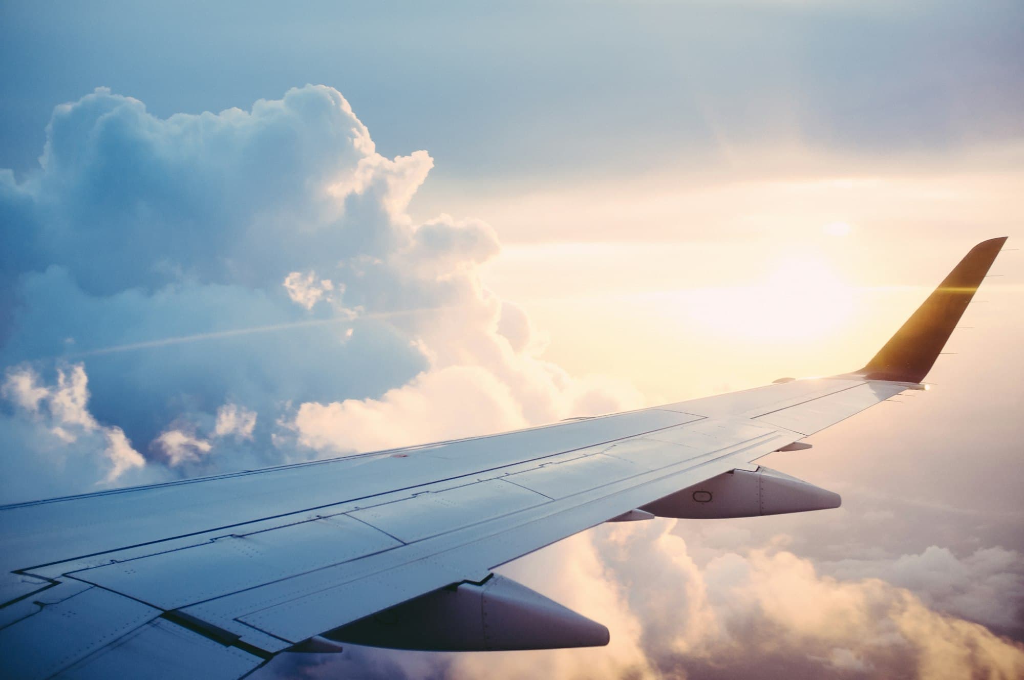 Aeroplane wing above the clouds
